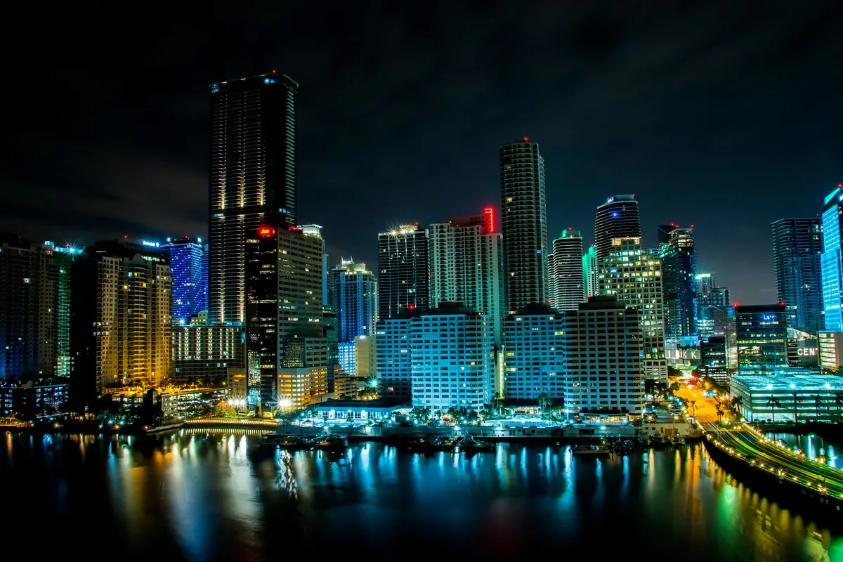 Miami skyline reflected in the bay at night